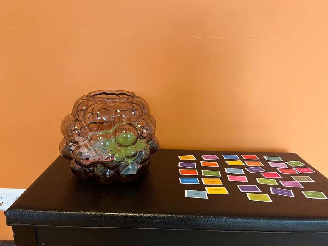 Affirmation cards and a bowl of treasures