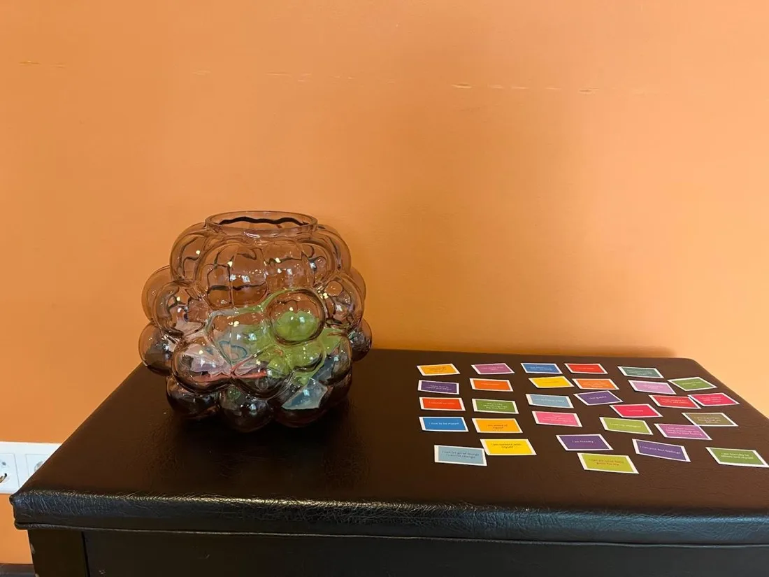 Affirmation cards and a bowl of treasures